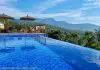 Como escolher hotel sem cair em pegadinha de preço: método prático para reservar melhor Piscina da pousada Discovery Canyon - Praia Grande SC
